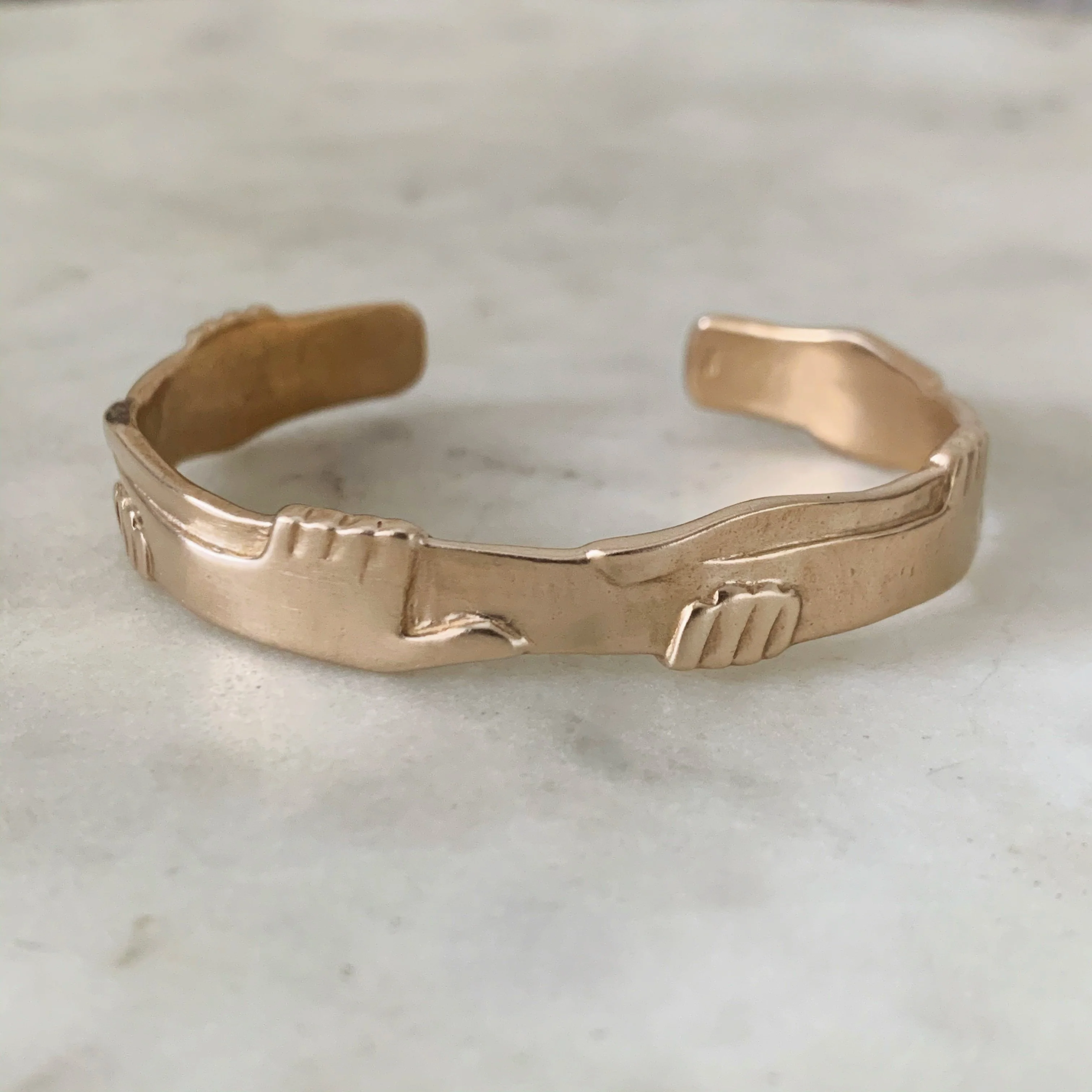 ARCHIVE — ONE HUMAN FAMILY CUFF